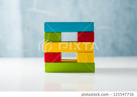 The wooden blocks are of the same length and have vivid colors. Developmental elements stimulate creative thinking and spatial imagination. 125547716