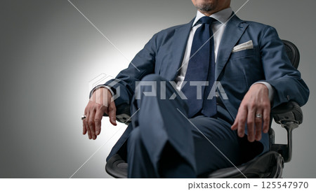 Businessman executive at hand Businessman executive at hand 125547970