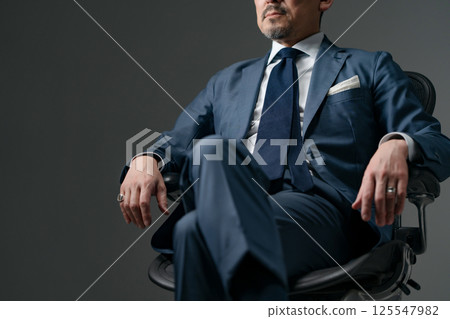 Businessman executive at hand Businessman executive at hand 125547982