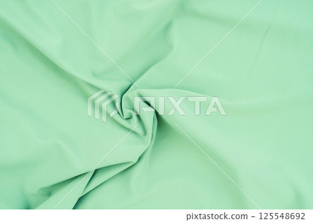 Green fabric with cotton texture, light green for backgrounds, textures, banners. Green fabric with cotton texture, light green for backgrounds, textures, banners. 125548692