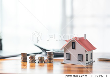 Mortgage loan enables individuals to buy home, turning rental expenses into wise investment, property ownership generates rental income and fosters financial stability through contractual agreement. 125549791