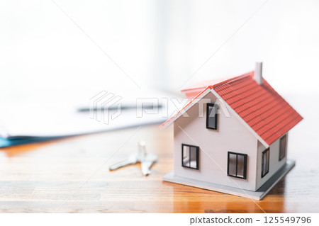Mortgage loan enables individuals to buy home, turning rental expenses into wise investment, property ownership generates rental income and fosters financial stability through contractual agreement. 125549796