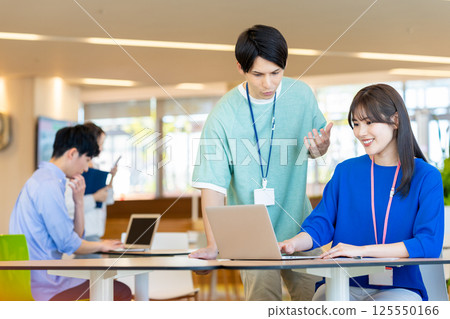 Businessmen working in an office. Photo courtesy of Denpa Gakuen, Tokyo Electronics College. Businessmen working in an office. Photo courtesy of Denpa Gakuen, Tokyo Electronics College. 125550166