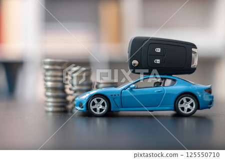 Business concept involved using finance calculator to determine premium for vehicle policy, ensuring clear financial contract for car. Investing in auto insurance can save money on transport costs. Business concept involved using finance calculator to determine premium for vehicle policy, ensuring clear financial contract for car. Investing in auto insurance can save money on transport costs. 125550710