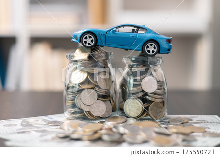 Business concept involved using finance calculator to determine premium for vehicle policy, ensuring clear financial contract for car. Investing in auto insurance can save money on transport costs. Business concept involved using finance calculator to determine premium for vehicle policy, ensuring clear financial contract for car. Investing in auto insurance can save money on transport costs. 125550721