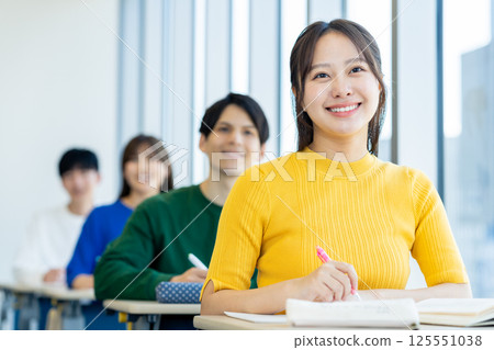 University students attending a lecture. Photo courtesy of Denpa Gakuen, Tokyo Electronics College. University students attending a lecture. Photo courtesy of Denpa Gakuen, Tokyo Electronics College. 125551038