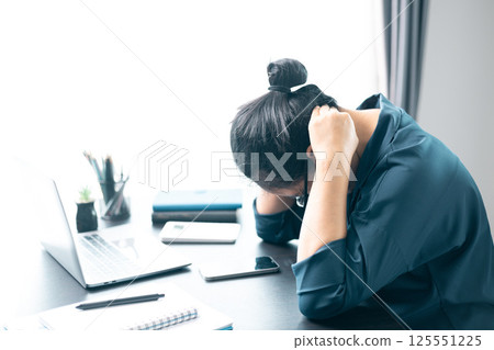 She sought medical advice for the ache in her shoulder, concerned it might indicate a muscle injury or underlying health problem affecting her body. ache, medical, pain, health, problem, shoulder. 125551225