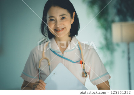 Night shift nurse in her 50s Night shift nurse in her 50s 125551232