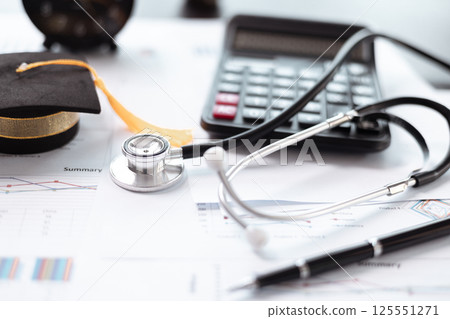 Earning degree in medicine requires significant saving and investment in education with careful financial planning crucial for aspiring doctors navigating banking and money management during studies. Earning degree in medicine requires significant saving and investment in education with careful financial planning crucial for aspiring doctors navigating banking and money management during studies. 125551271