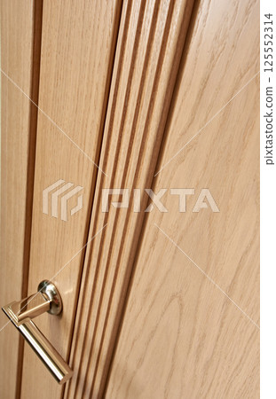 Closed wooden door Closed wooden door 125552314