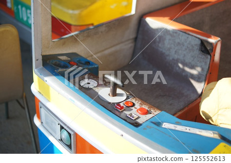 Old amusement park ride control panel 125552613