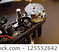 The internal mechanism of an analog camera 125552642