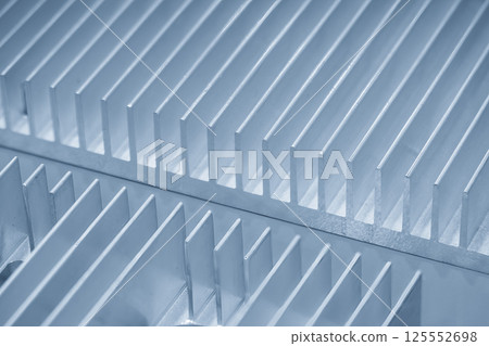 The aluminum heat sink parts in the light blue scene. 125552698