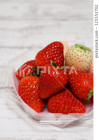 fresh strawberries (white and red) fresh strawberries (white and red) 125552702