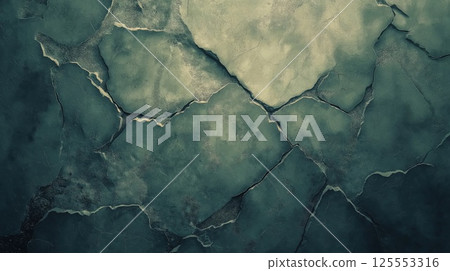 Textured concrete surface displays a pattern of cracks and uneven patches, showcasing the wear of the material. The muted colors contribute to an atmosphere of urban decay and aging 125553316