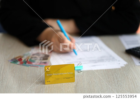 Indonesian golden social security card originally called Kartu perlindungan sosial. Card for financial support 125553954