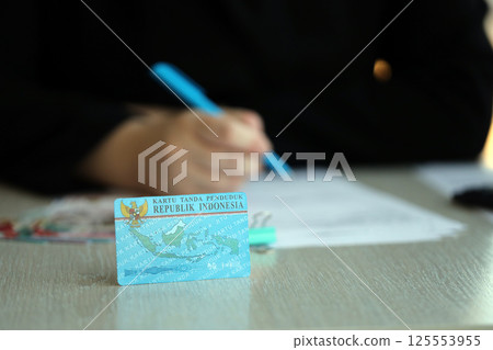 Indonesian national electric identity card called E-KTP or Kartu Tanda Penduduk. Card for citizens or permanent residents 125553955