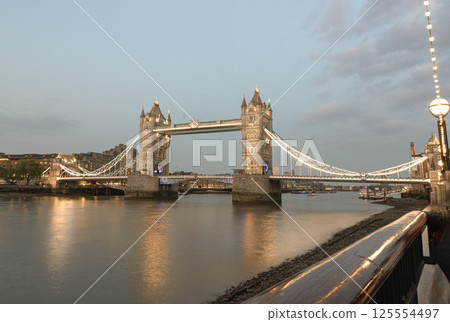 Sunset view of The Iconic Tower Bridge with sky in the background. Sunset view of The Iconic Tower Bridge with sky in the background. 125554497