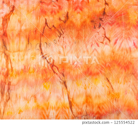 abstract pattern on silk fabric texture in yellow and brown tones 125554522