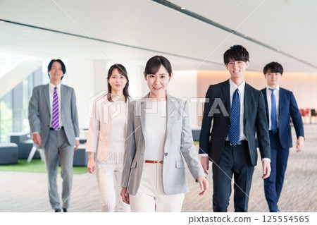 Businesspeople working under strong female leaders Businesspeople working under strong female leaders 125554565