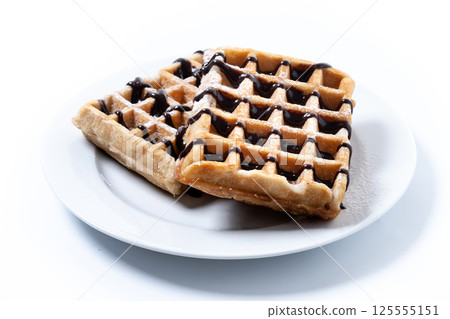Belgian Waffles with chocolate isolated on white background 125555151