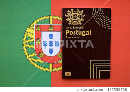 Red Portugal passport of European Union on national flag background close up 125556708