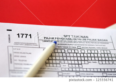 Indonesian tax form 1771 corporate taxpayers annual income tax return with pen 125556741