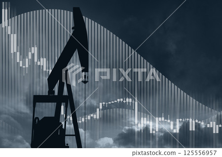 Oil rig on a background of a dramatic sky with down arrow. Symbol of the collapse in the oil industry 125556957