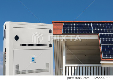 Solar panels on a roog of country house with renewable energy storage 125556982