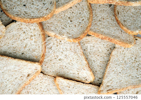 Fresh sliced bread in full frame macro photo 125557046