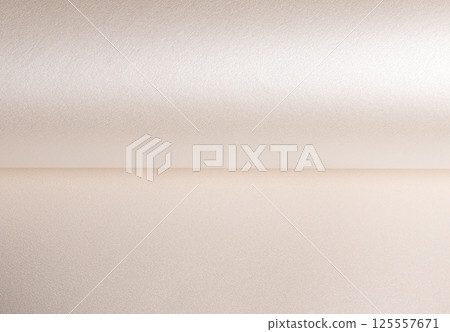 Background with satin paper texture. Folded roll with pearlescent gradient in champagne, beige, pale Background with satin paper texture. Folded roll with pearlescent gradient in champagne, beige, pale 125557671