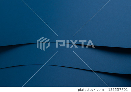 Matte designer paper texture with layered, curved arcs and smooth surface. Elegant, clean 125557701