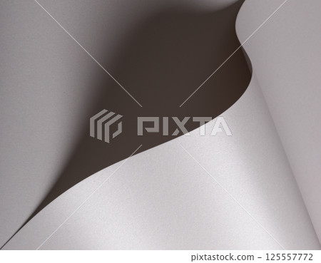 Pearl satin paper background with a glossy, smooth texture and sculptural layered folds. Icy silver 125557772