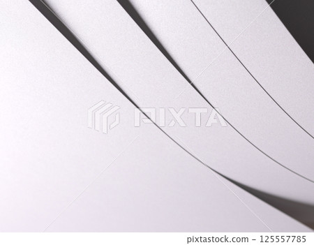 White pearl paper background with a glossy satin texture and layered strips. Pale grey and icy 125557785