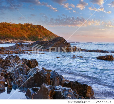 Sunrise ocean view from beach (Bay of Biscay). Sunrise ocean view from beach (Bay of Biscay). 125558693