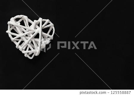 Elegant White Blossoms on Spa Stones with Minimalist Black Background Elegant White Blossoms on Spa Stones with Minimalist Black Background 125558887