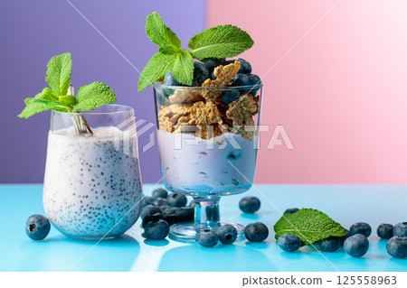 Blueberry dessert with rye flakes and smoothie with chia seeds. Blueberry dessert with rye flakes and smoothie with chia seeds. 125558963