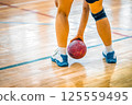 Handball, player holding ball, team indoor sport 125559495