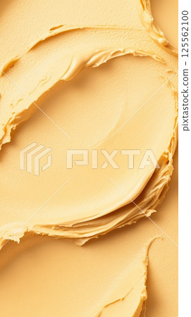 Elegant hoop earrings with a matte finish and gold accents arranged on a mocha background Elegant hoop earrings with a matte finish and gold accents arranged on a mocha background 125562100