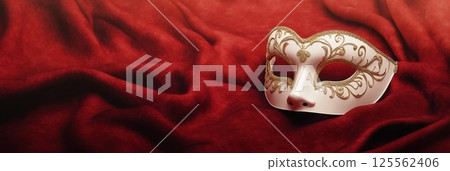 Intricate Venetian masquerade mask on rich velvet backdrop in elegant hand drawn style 125562406
