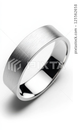 Stylish matte metal bangle offers minimalist elegance on a white background 125562658