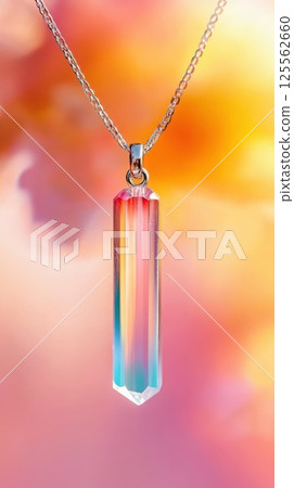Elegant transparent quartz crystal pendant necklace with a graceful design and soft background 125562660