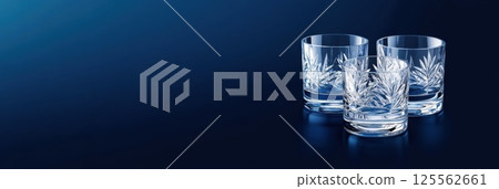 Exquisite Czech crystal glass with elegant engravings on deep blue background 125562661