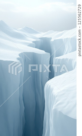 Sunlight illuminates a deep, narrow crevasse cutting through a pristine, snow covered landscape, creating a dramatic contrast of light and shadow in a remote arctic environment 125562729