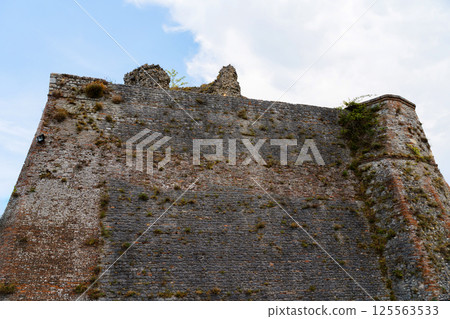 Ancient stone fortification wall Rocca Malatestiana di Verucchio o del Sasso in Italy 125563533