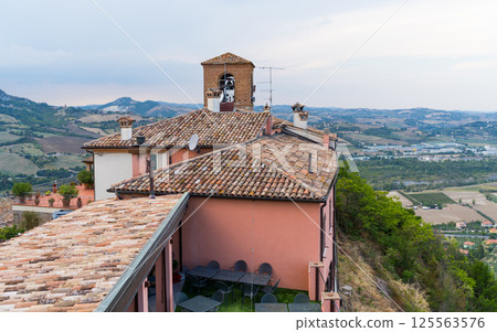 Scenic italian countryside in autumn with historic architecture and rolling hills in Verucchio, Italy 125563576