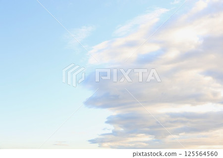 Clouds floating in the early morning blue sky Clouds floating in the early morning blue sky 125564560