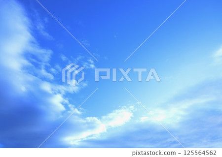 Clouds floating in the early morning blue sky 125564562