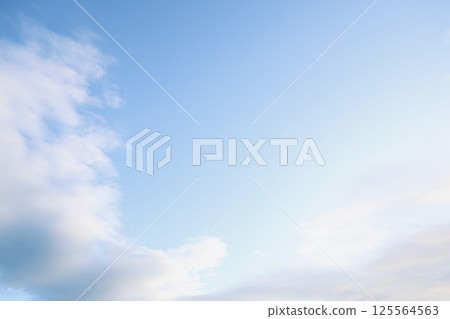 Clouds floating in the early morning blue sky 125564563