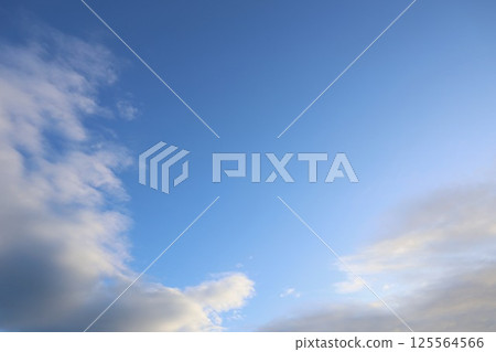 Clouds floating in the early morning blue sky 125564566